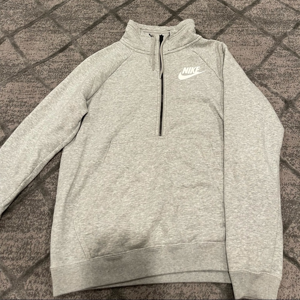 Nike size small grey half zip up.